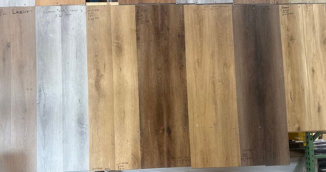 Sufian LVP samples on the display wall with thickness and price marked