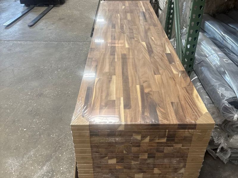 Stack of walnut butcher block countertops